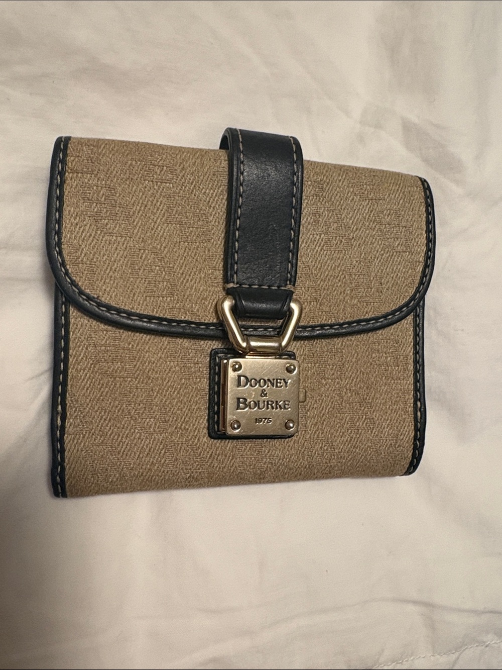 Dooney & Bourke Tan Wallet with Black Trim and Gold Hardware